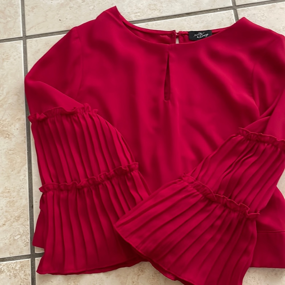 Red cropped long sleeved top. Size M